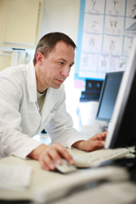 doctor looking at ICD-10 codes